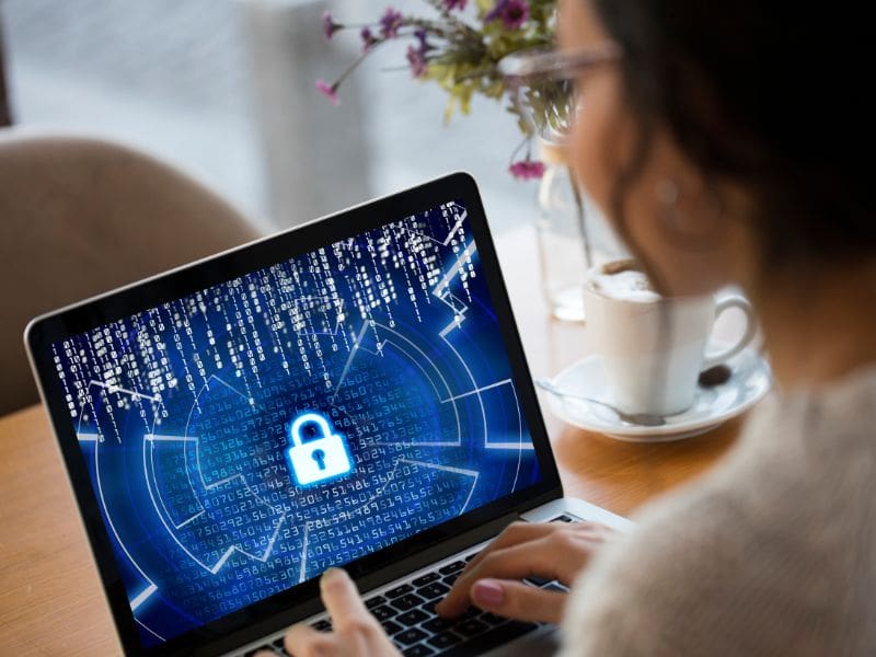 A professional analyzing cybersecurity data on a digital screen, representing the evolving landscape of online security. My Tampa IT helps businesses adapt to the new reality of cybersecurity.